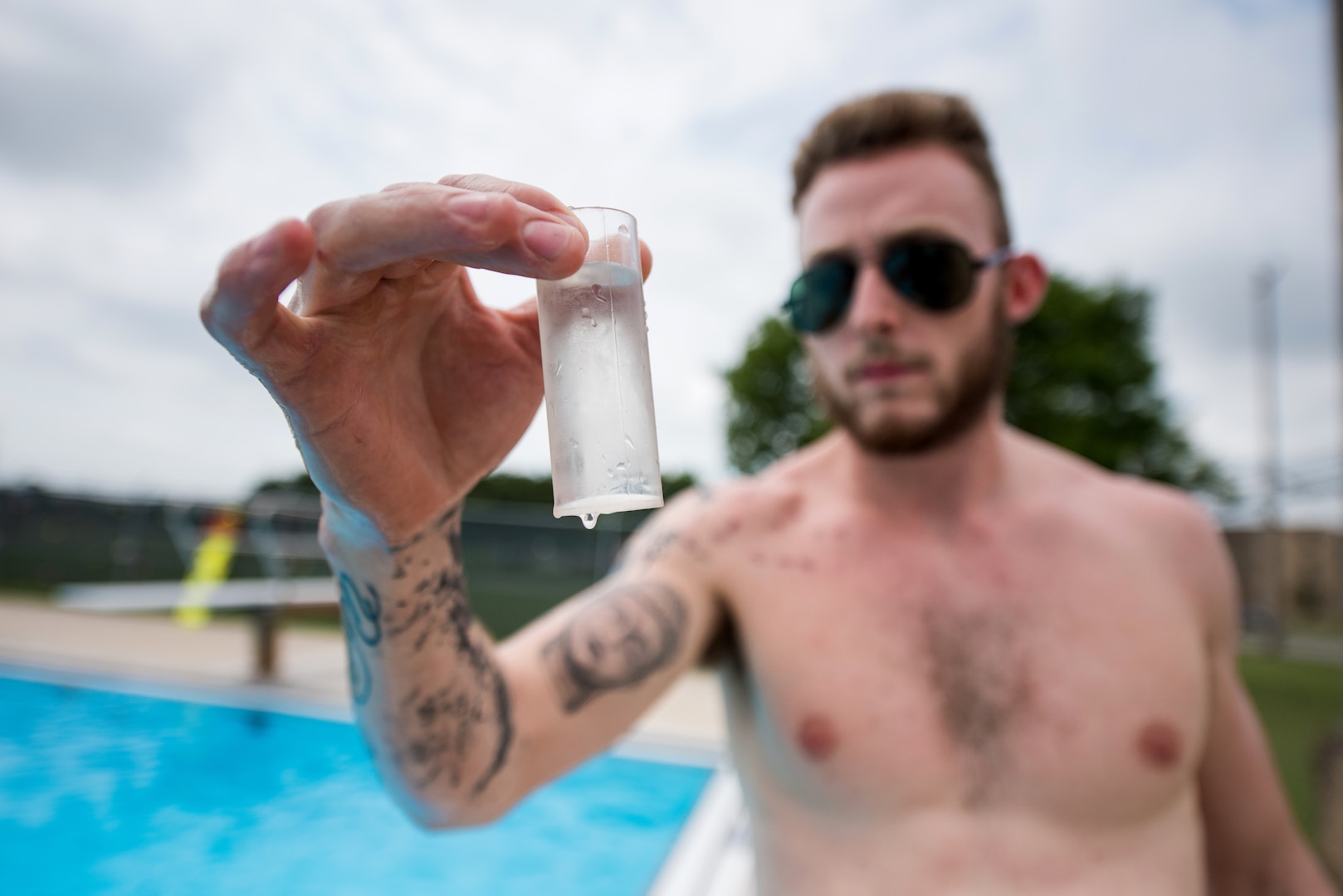 Bailey Parker, 502nd Force Support Squadron lifeguard, takes a water sample before opening the Warhawk pool, June 21, 2019, at Joint Base San Antonio-Lackland, Texas.