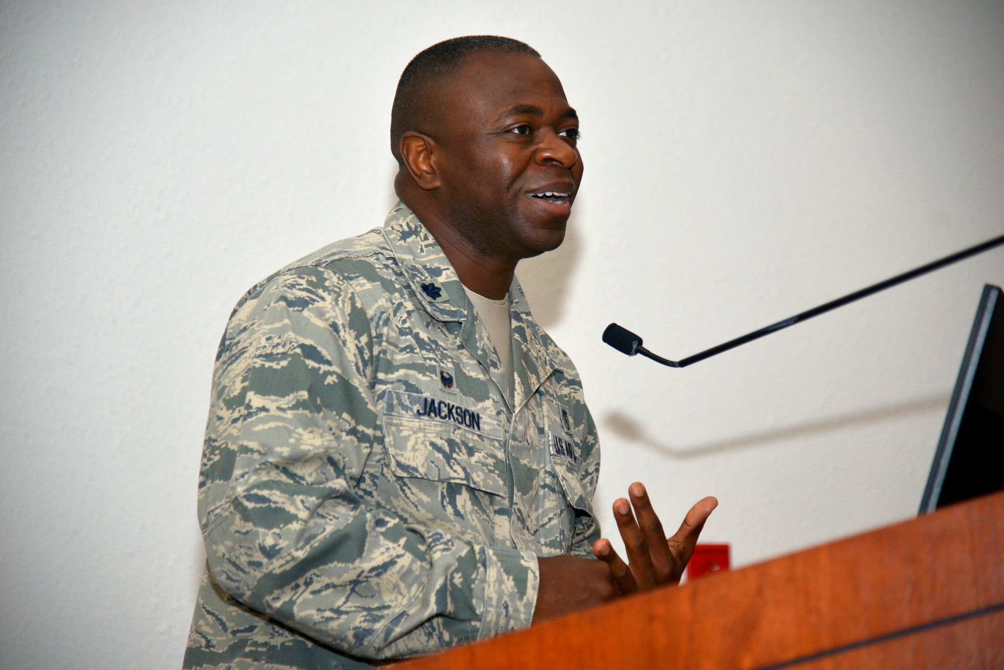 U.S. Air Force Lt. Col. Norris Jackson, 81st Surgical Operations Squadron commander, addresses his new command during the 81st MSGS change of command ceremony in the Don Wylie Auditorium at Keesler Air Force Base, Mississippi, July 9, 2019. Jackson assumed command from Col. Ryan Mihata, outgoing 81st MSGS commander. (U.S. Air Force photo by Airman Seth Haddix)