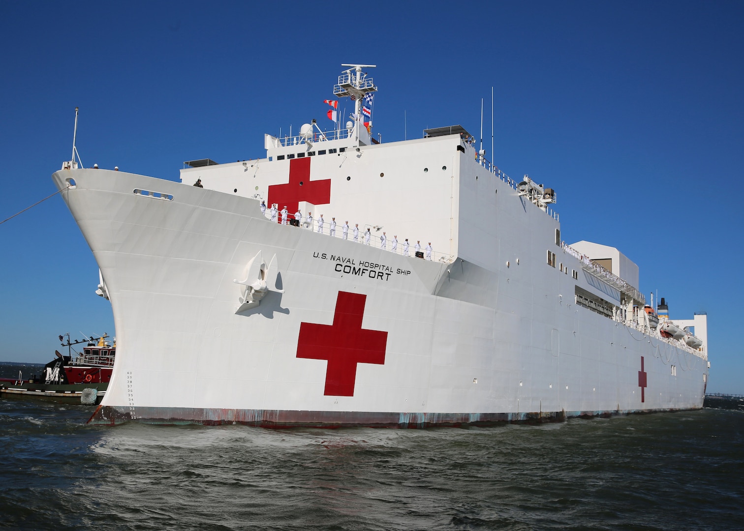 A view of the U.S. Navy Hospital Ship USNS Comfort as it departs Naval Station Norfolk, June 14.