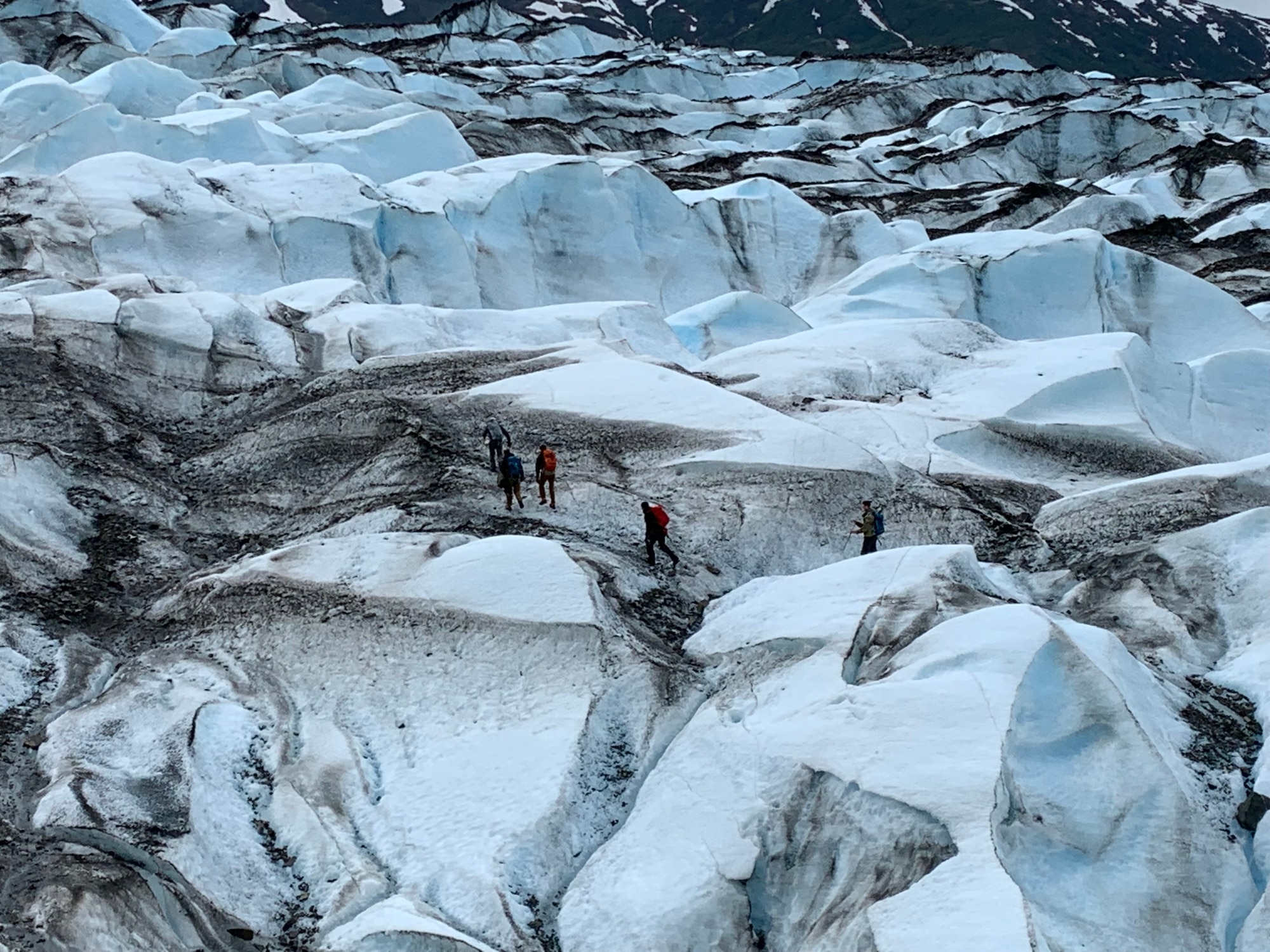 Recovery team members traverse Colony Glacier, Alaska, June 2019. The recovery team was searching for remains from a C-124 Globemaster II that crashed into Gannett Mountain, Alaska, on Nov. 22, 1952, while flying from McChord Air Force Base, Washington, to Elmendorf Air Force Base, Alaska resulting in the loss of 52 service members. (Courtesy photo)