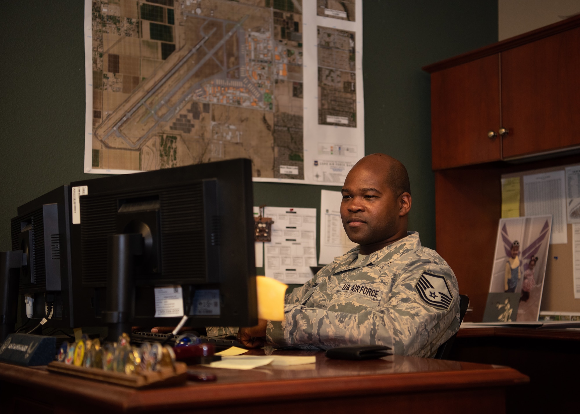 Master Sgt. Antonio Montgomery, 56th Fighter Wing Flight Safety Office flight safety noncommissioned officer, finishes a safety report July 9, 2019, at Luke Air Force Base, Ariz. The flight safety office oversees the safety of the operations on the flightline, including the Airmen, aircraft and runway, ensuring the day-to-day operations are not hindered. (U.S. Air Force photo by Airman 1st Class Aspen Reid)