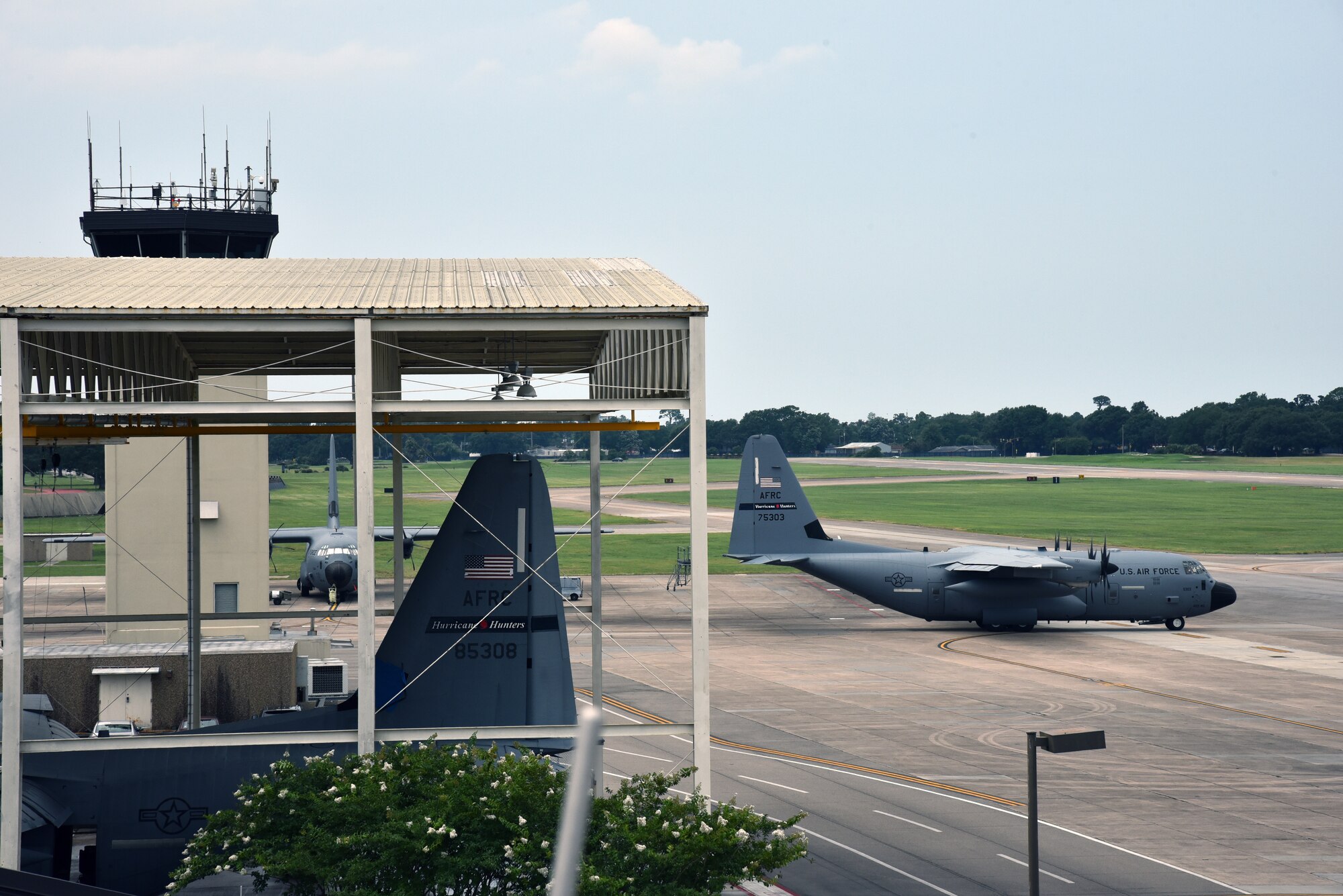 A WC-130J Super Hercules from the 53rd Weather Reconnaissance Squadron, aka Hurricane Hunters, taxis to the runway July 10, 2019 at Keesler Air Force Base, Mississippi. The Super Hercules aircraf took off midday for an investigative flight into a tropical depression over the Gulf of Mexico. (U.S. Air Force photo by Tech. Sgt. Christopher Carranza)