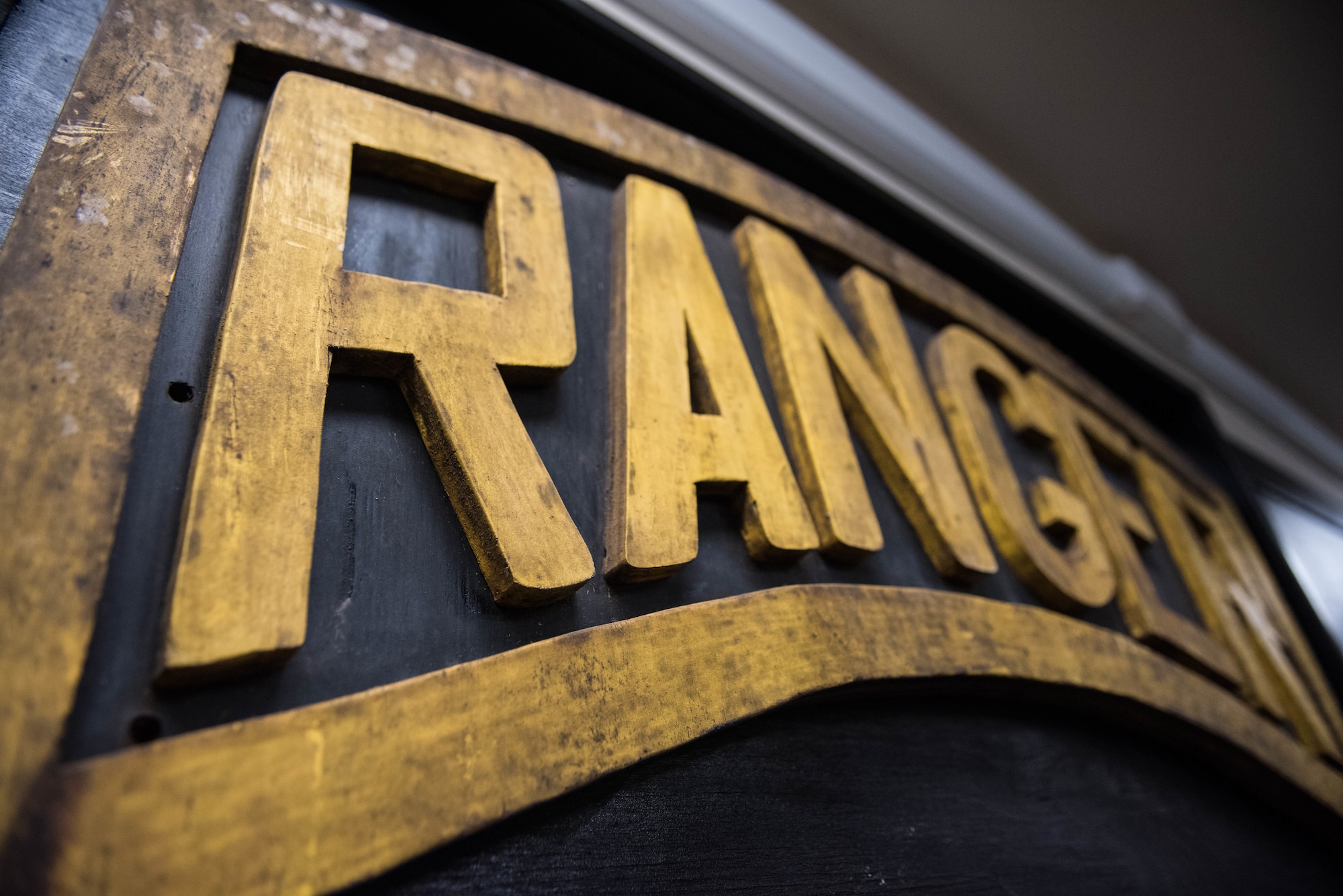 A Ranger sign hangs up inside at a training camp near Schofield Barracks, Oahu, Hawaii, May 13, 2019. Twenty-three Airmen from across the Air Force recently converged on a training camp for a three-week Ranger Assessment Course near Schofield Barracks, May 12-31, 2019. The purpose of the 19-day course is to prepare, assess and evaluate Air Force candidates for Army Ranger School. (U.S. Air Force photo by Staff Sgt. Hailey Haux)