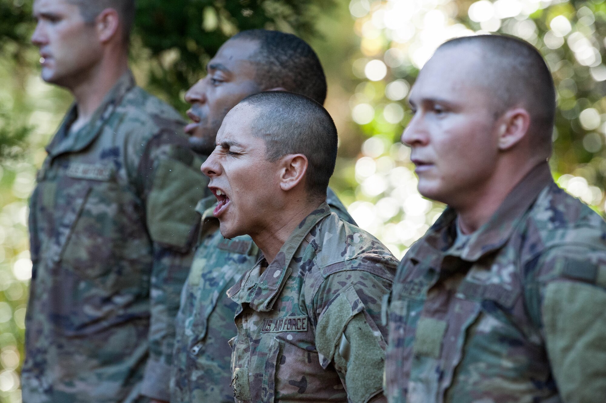 Tech. Sgt. Christian Varela, Ranger Assessment Course student, recites the third stanza of the Ranger Creed before they begin an obstacle course at a training camp near Schofield Barracks, Oahu, Hawaii, May 20, 2019. Twenty-three Airmen from across the Air Force recently converged on a training camp for a three-week Ranger Assessment Course near Schofield Barracks, May 12-31, 2019. The Airmen who pass the RAC gain more than a ticket into Ranger School and knowledge on Army tactics – they learn to lead. (U.S. Air Force photo by Staff Sgt. Hailey Haux)