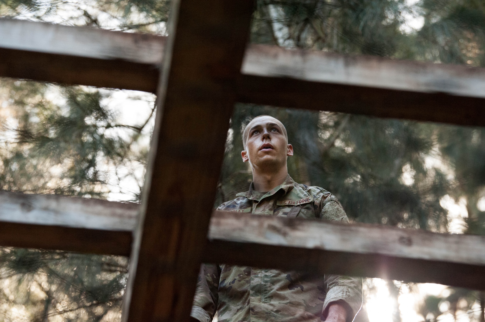 Tech. Sgt. Alexander Morley, Ranger Assessment Course student, prepares to make his was across an obstacle course during that portion of the RAC near Schofield Barracks, Oahu, Hawaii, May 20, 2019. Twenty-three Airmen from across the Air Force recently converged on a training camp for a three-week Ranger Assessment Course near Schofield Barracks, May 12-31, 2019. The purpose of the 19-day course is to prepare, assess and evaluate Air Force candidates for Army Ranger School. (U.S. Air Force photo by Staff Sgt. Hailey Haux)
