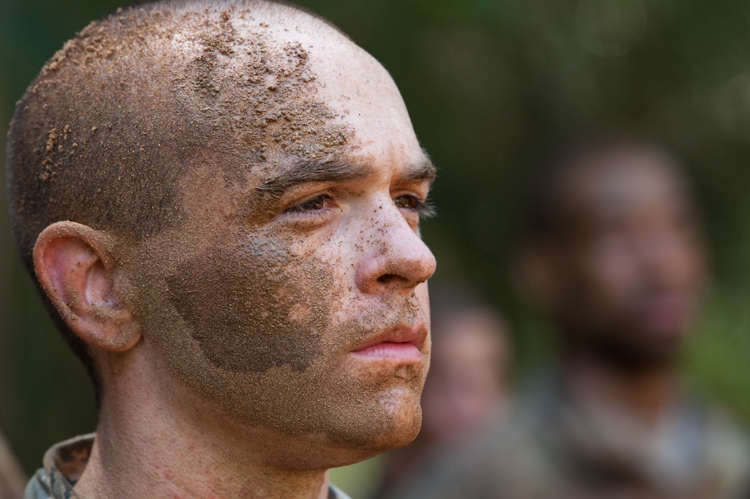 2nd Lt. Sam Good, Ranger Assessment Course student, assesses the next hurdle during the obstacle course near Schofield Barracks, Oahu, Hawaii, May 20, 2019. Twenty-three Airmen from across the Air Force recently converged on a training camp for a three-week Ranger Assessment Course May 12-31, 2019. For this iteration, the Air Force collaborated with the Army’s 25th Infantry Division, Small Unit Ranger Tactics Program – their version of a pre-Ranger course – in order to gain a better understanding for the way the Army prepares their candidates for Ranger School. (U.S. Air Force photo by Staff Sgt. Hailey Haux)