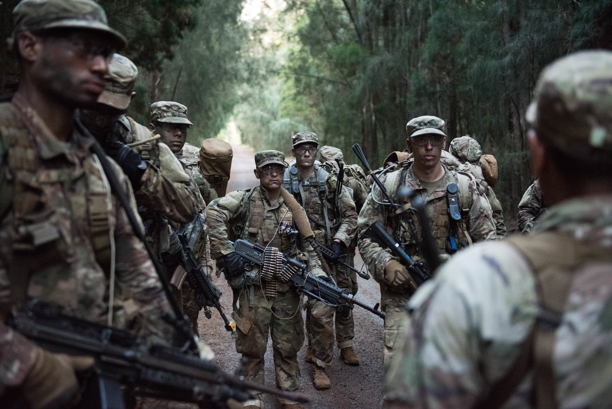 Ranger Assessment Course students are instructed on the prime locations for an ambush during training near Schofield Barracks, Oahu, Hawaii, May 23, 2019. Twenty-three Airmen from across the Air Force recently converged on a training camp for a three-week Ranger Assessment Course May 12-31, 2019. (U.S. Air Force photo by Staff Sgt. Hailey Haux)