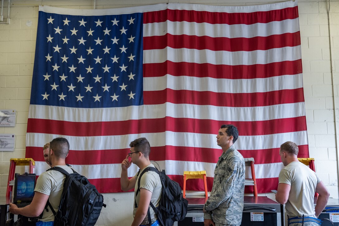 Airmen assigned to the 44th Aircraft Maintenance Unit wait in line to turn in or check out tools during shift turnover June 27, 2019, on Kadena Air Base, Japan.