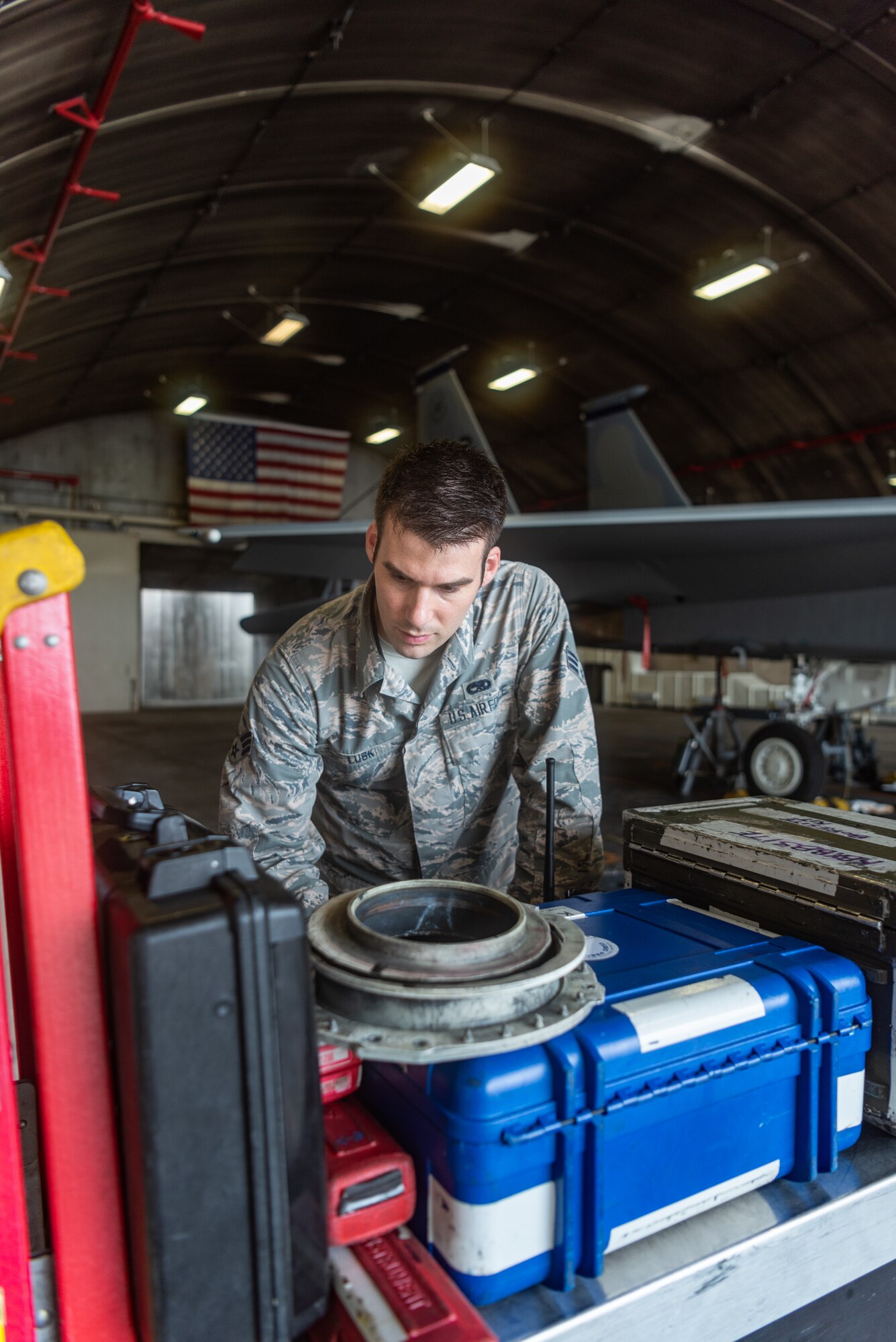 U.S. Air Force Senior Airman Joshua Lusk, F-15C Eagle support journeyman assigned to the 44th Aircraft Maintenance Unit, performs a remote toolbox inventory during shift turnover June 27, 2019, on Kadena Air Base, Japan.
