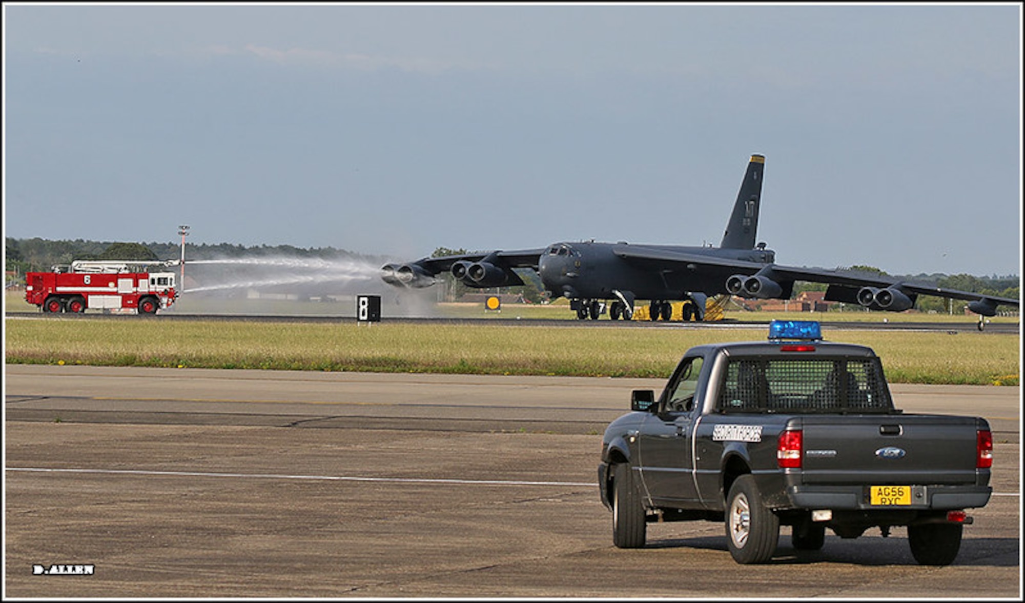 Firefighters from the 100th Civil Engineer Squadron extinguish an engine fire aboard a B-52H Stratofortress from Minot Air Force Base, North Dakota, at RAF Mildenhall, England, June 17, 2019. The B-52 was taking part in an exercise over Europe when it experienced an in-flight emergency declared as a result of an engine fire warning. (Courtesy photo)