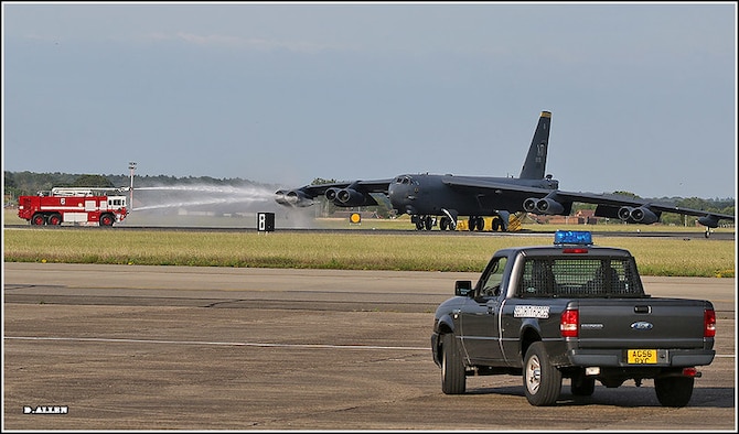 Firefighters from the 100th Civil Engineer Squadron extinguish an engine fire aboard a B-52H Stratofortress from Minot Air Force Base, North Dakota, at RAF Mildenhall, England, June 17, 2019. The B-52 was taking part in an exercise over Europe when it experienced an in-flight emergency declared as a result of an engine fire warning. (Courtesy photo)