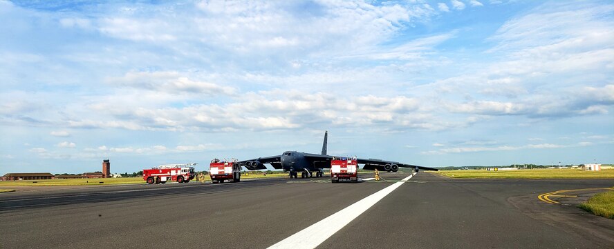 Firefighters from the 100th Civil Engineer Squadron respond to an engine fire aboard a B-52H Stratofortress from Minot Air Force Base, North Dakota, at RAF Mildenhall, England, June 17, 2019. The B-52H was operating in the European theater supporting several exercises while in the region. (Courtesy photo)
