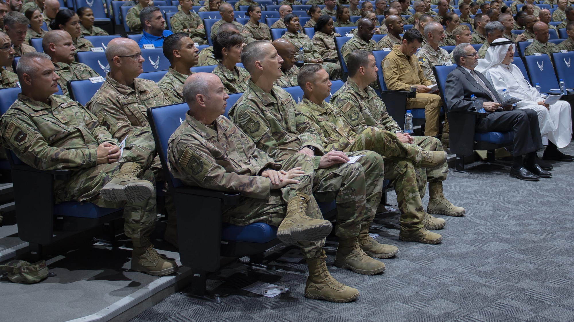 U.S. Airmen, base leadership, personnel, allies and community partners attend the 386th Air Expeditionary Wing change of command ceremony at Ali Al Salem Air Base, Kuwait, July 11, 2019. U.S. Air Force Col. Rodney Simpson assumed command of the 386th AEW. (U.S. Air Force photo by Tech. Sgt. Daniel Martinez)