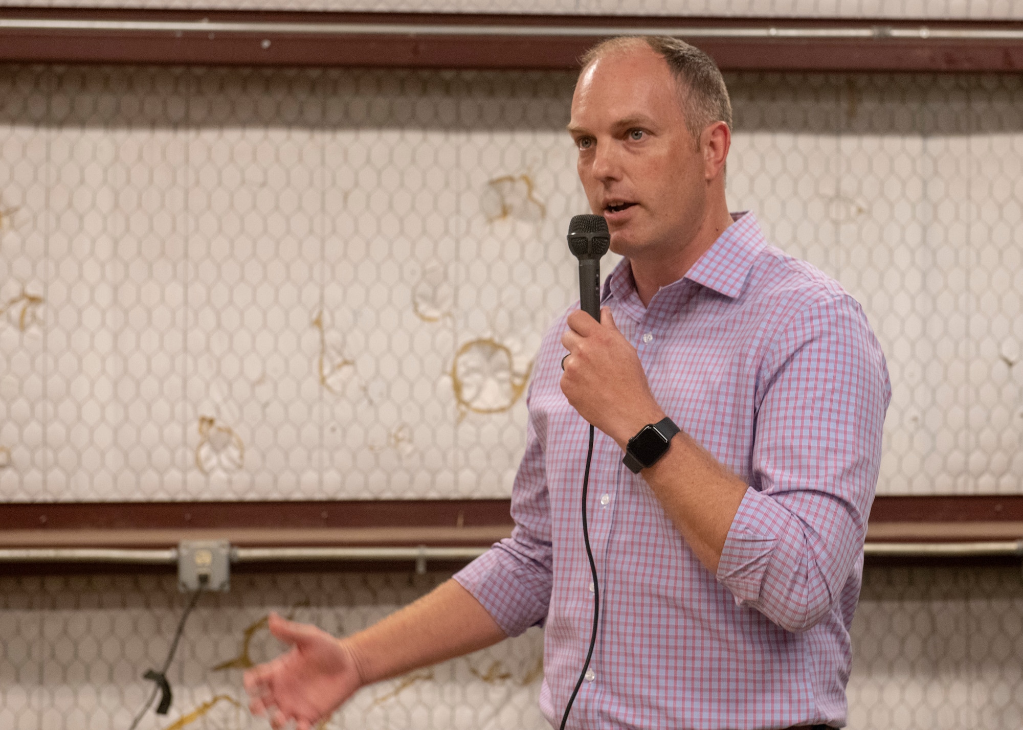 Col. Matthew Leard, 97th Air Mobility Wing commander, speaks to the newcomers, returning deployers and member of the community during the quarterly Committee of 100 dinner, July 8, 2019, at Altus, Okla. Leard stressed the importance of the event and the uniqueness of the community partnership between at the 97th AMW and the City of Altus.