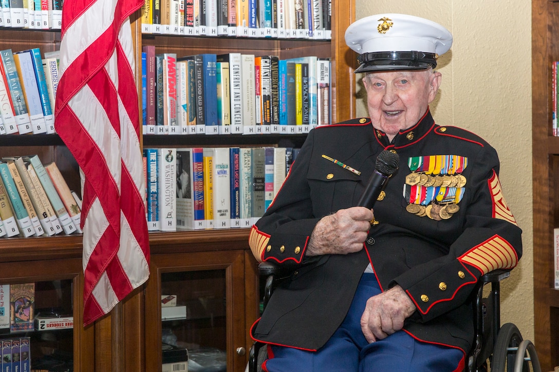 Retired U.S. Marine 1st Sgt. John Farritor gives a speech during his 100th birthday celebration at the Pacifica Senior Living Center in Vista, California, July 9, 2019.  Farritor not only fought in the battles of Iwo Jima, Inchon Landing and Chosin Reservoir as an artillery Marine, he was also a part of the 55-mile march from Camp Elliott to Camp Pendleton when the installation opened in 1942. (U.S. Marine Corps photo by Lance Cpl. Drake Nickels)