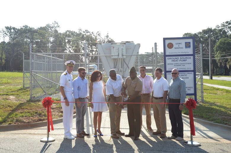 During a ribbon-cutting ceremony aboard Marine Corps Logistics Base Albany, July 9, base officials moved one step closer to achieving their NetZero energy resiliency goals.  Phase Two of the Borehole Thermal Energy Storage Systems and Ground Source Heat Pumps that will serve buildings in the downtown area of the base were officially commissioned for use.