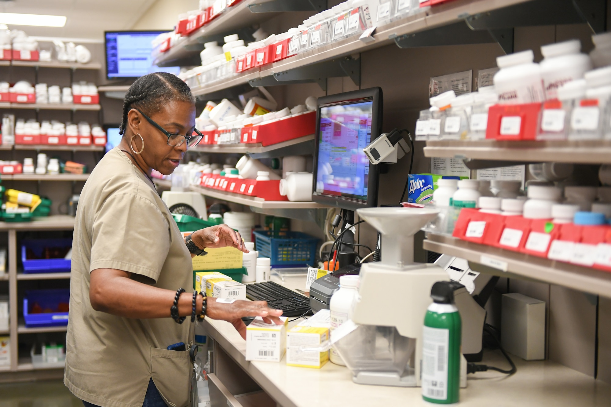 Crystal Coats, pharmacy technician, prepares prescriptions at the Staff Sgt. Derek F. Ramos Satellite Pharmacy located inside the AAFES Base Exchange at Hill Air Force Base, Utah, July 10, 2019. (U.S. Air Force photo by Cynthia Griggs)