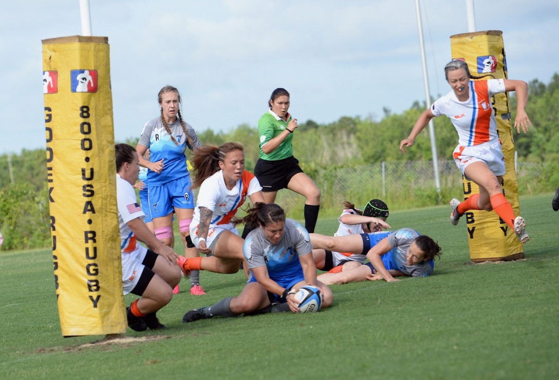 WILMINGTON, N.C. (June 6, 2019) -- Air Force faces off against Coast Guard on day two of the inaugural Armed Forces Women's Rugby Championship held in Wilmington, N.C. July 5-7, 2019. This historic event features the best female rugby players from the Army, Marine Corps, Navy, Air Force, and Coast Guard, who will compete for the title of the first ever Women's Rugby Champs (U.S. Dept. of Defense photo by Chief Mass Communication Specialist Patrick Gordon/RELEASED)