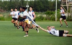 WILMINGTON, N.C. (June 6, 2019) -- Navy faces off against Marine Corps on day two of the inaugural Armed Forces Women's Rugby Championship held in Wilmington, N.C. July 5-7, 2019. This historic event features the best female rugby players from the Army, Marine Corps, Navy, Air Force, and Coast Guard, who will compete for the title of the first ever Women's Rugby Champs (U.S. Dept. of Defense photo by Chief Mass Communication Specialist Patrick Gordon/RELEASED)