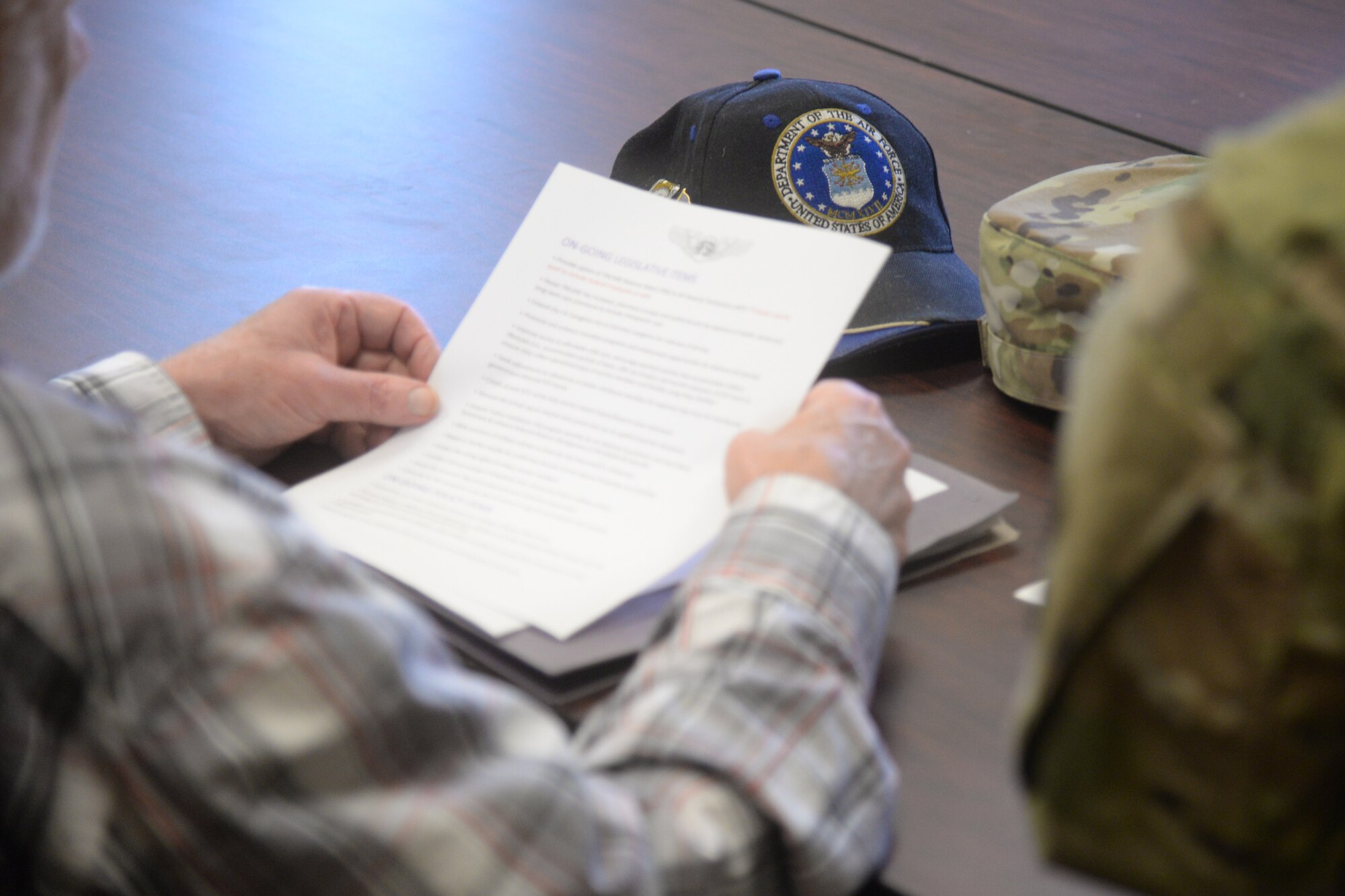 Jim Simmonds, Air Force Sergeants Association recruiter, looks over legislation during a meeting July 10, 2019, at Malmstrom Air Force Base, Mont.
