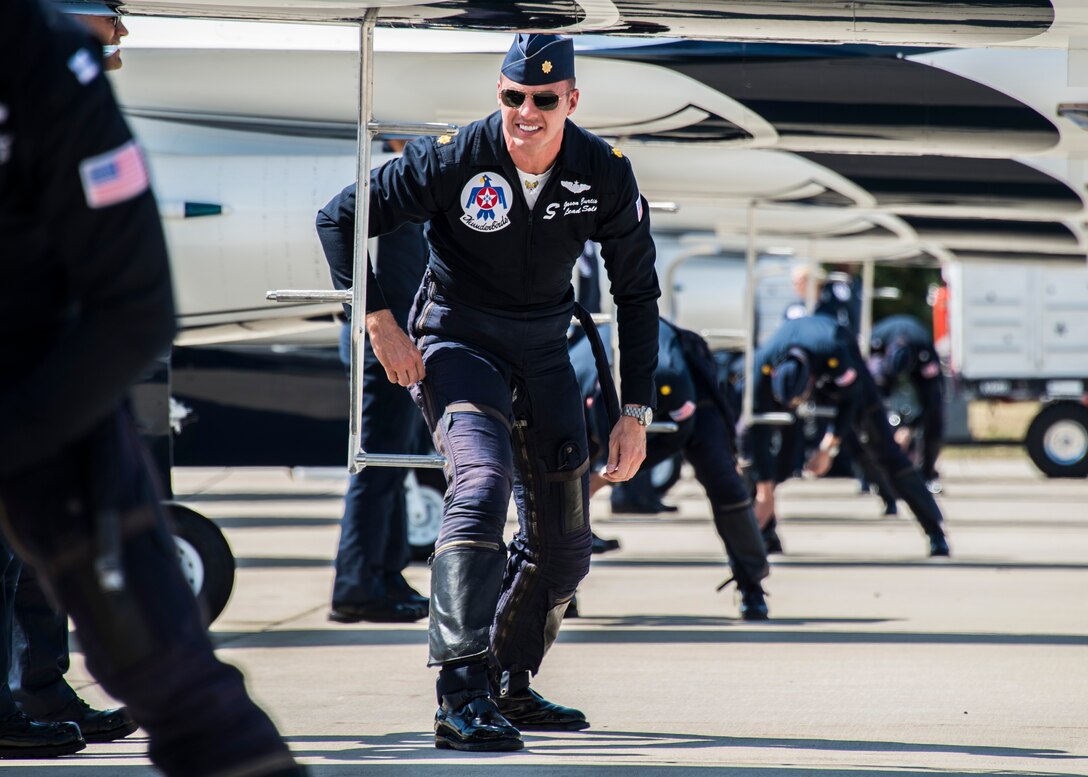 Maj. Jason Curtis, then Thunderbird 5, dons his anti g-suit before the U.S. Air Force tattoo practice flyover, Sept. 17, 2015, at Joint Base Andrews, Maryland. (U.S. Air Force photo/Senior Airman Jason Couillard)