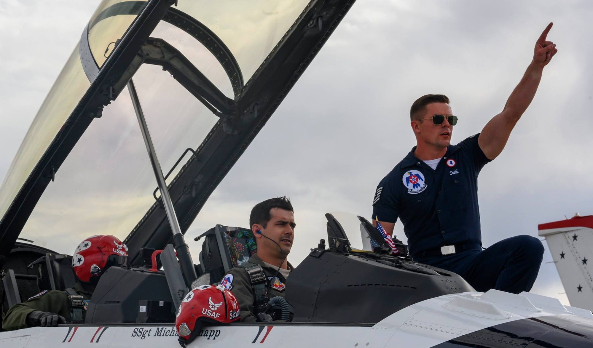 Maj. Whit Collins sits in the front seat of an F-16D wearing the Attenuating Custom Communications Earpiece System (ACCES®), a technology researched and developed by AFRL’s 711th Human Performance Wing in the 2000s. (Courtesy photo)