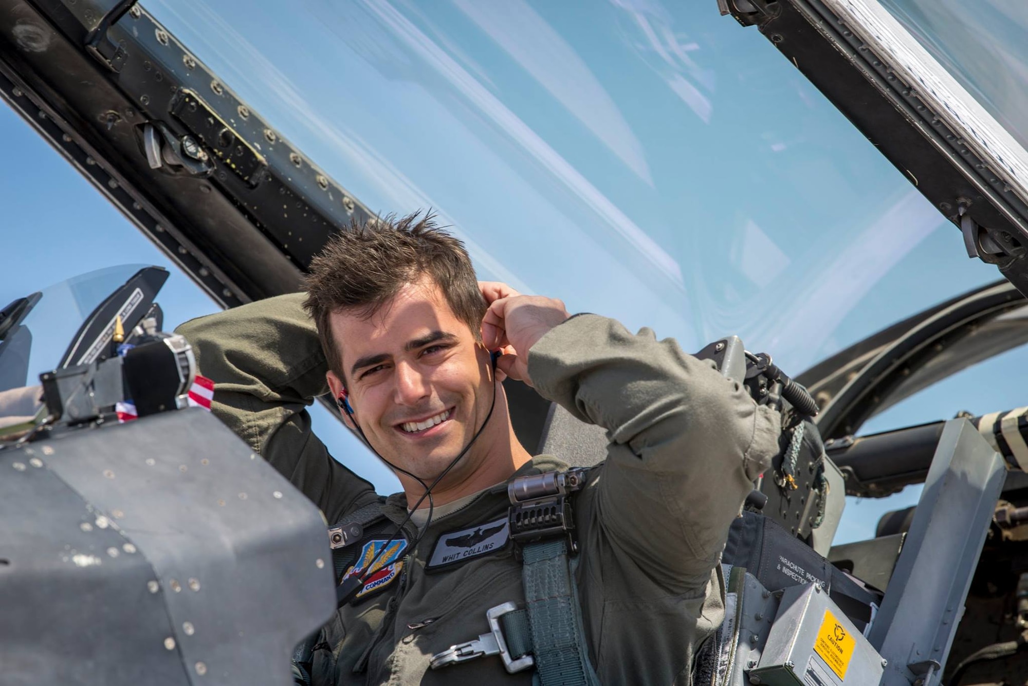 Maj. Whit Collins, Thunderbird No. 4, wears the Attenuating Custom Communications Earpiece System (ACCES®), a technology researched and developed by AFRL’s Human Performance Wing in the 2000s. (Courtesy photo)