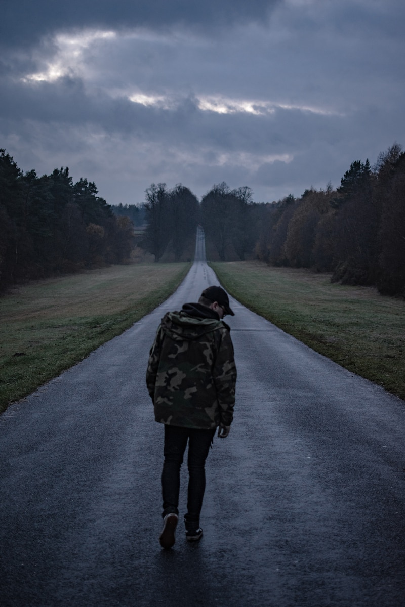 SrA Daxton Perkins, friend of the photographer. Artist says the photo depicts feelings of loneliness as well as metaphorically having a long road ahead through stormy weather.