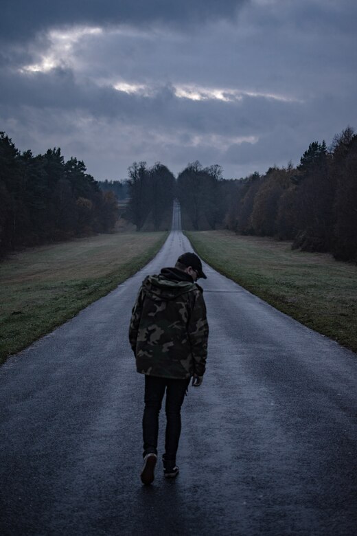 SrA Daxton Perkins, friend of the photographer. Artist says the photo depicts feelings of loneliness as well as metaphorically having a long road ahead through stormy weather.
