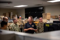 190711-N-OE749-0006 JOINT BASE LANGLEY-EUSTIS, Va. (July 11, 2019) Rick George, deputy director of communications at Joint Task Force Civil Support, gives a tour of the communication spaces and equipment at the command as part of the annual JTF-CS Defense Chemical, Biological, Radiological, Nuclear Response Force (DCRF) Communications Workshop. The two-day course is geared toward enhancing DCRF operations by providing vital training and face-to-face interaction between current and follow-on DCRF units. (U.S. Navy photo by Chief Mass Communication Specialist Barry A. Riley/RELEASED)