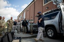 190711-N-OE749-0023 JOINT BASE LANGLEY-EUSTIS, Va. (July 11, 2019) Dequinn McGraw, a telecommunication specialist assigned to Joint Task Force Civil Support, gives a tour of an emergency response vehicle and other communication equipment as part of the annual JTF-CS Defense Chemical, Biological, Radiological, Nuclear Response Force (DCRF) Communications Workshop. The two-day course is geared toward enhancing DCRF operations by providing vital training and face-to-face interaction between current and follow-on DCRF units. (U.S. Navy photo by Chief Mass Communication Specialist Barry A. Riley/RELEASED)