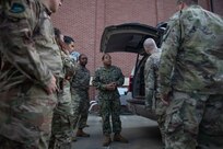 190711-N-OE749-0030 JOINT BASE LANGLEY-EUSTIS, Va. (July 11, 2019) Navy Information Systems Technician 1st Class Albert Givens, assigned to the communications department at Joint Task Force Civil Support, gives a tour of the command and control vehicle as part of the annual JTF-CS Defense Chemical, Biological, Radiological, Nuclear Response Force (DCRF) Communications Workshop. The two-day course is geared toward enhancing DCRF operations by providing vital training and face-to-face interaction between current and follow-on DCRF units. (U.S. Navy photo by Chief Mass Communication Specialist Barry A. Riley/RELEASED)