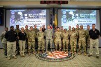 190711-N-OE749-0036 JOINT BASE LANGLEY-EUSTIS, Va. (July 11, 2019) Defense Chemical, Biological, Radiological, Nuclear Response Force (DCRF) Communications Workshop attendees pose for a photo at Joint Task Force Civil Support. The annual two-day course is geared toward enhancing DCRF operations by providing vital training and face-to-face interaction between current and follow-on DCRF units. (U.S. Navy photo by Chief Mass Communication Specialist Barry A. Riley/RELEASED)