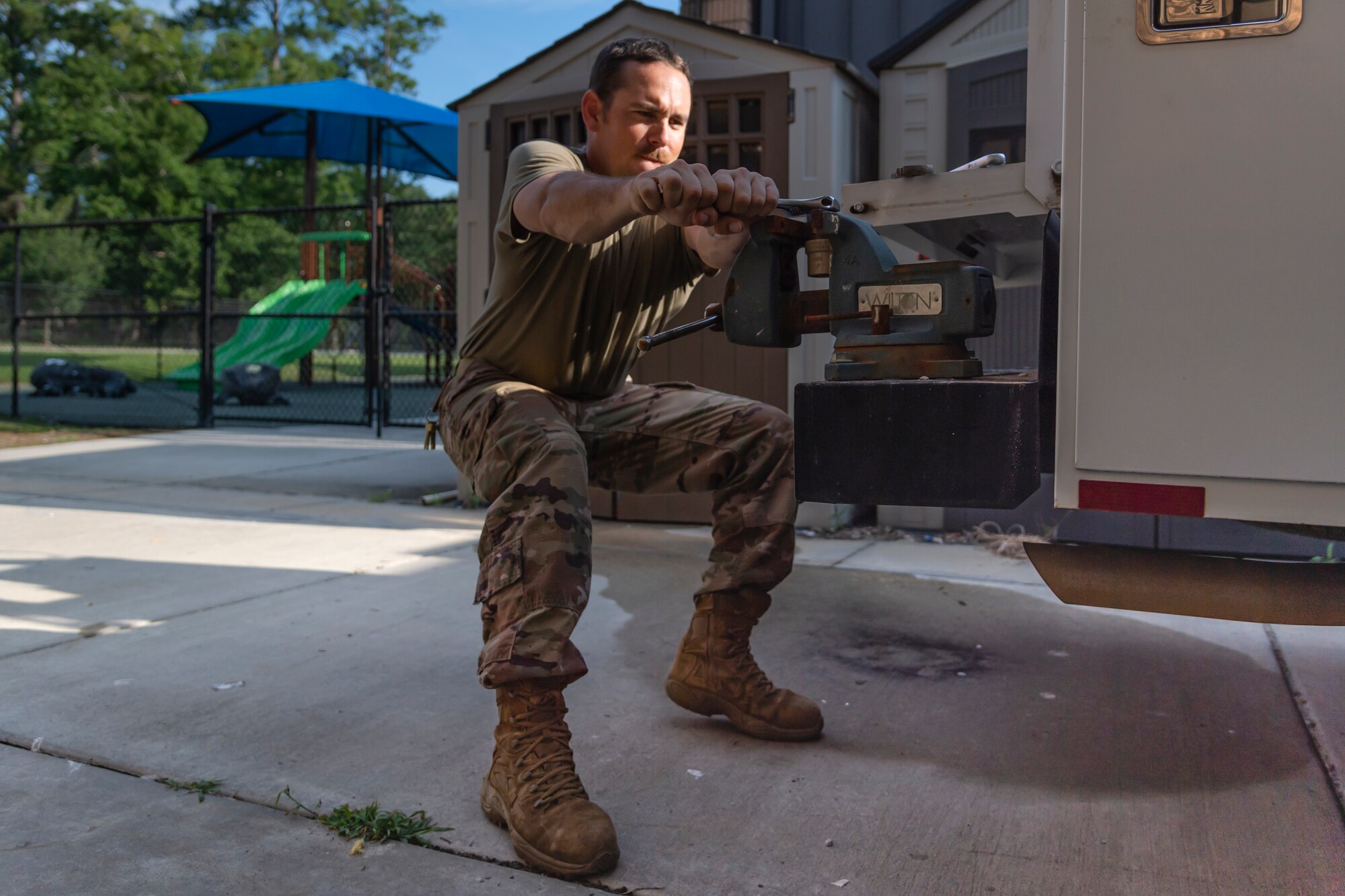Staff Sgt. Daniel Champion, 23d Civil Engineer Squadron (CES) water and fuel systems maintenance craftsman, tightens a plug into a fitting, July 2, 2019, at Moody Air Force Base, Ga. Airmen from the 23d CES Water and Fuels Systems Maintenance are on-call 24/7 to sustain and maintain the base, water, sewer and gas lines and upkeep of the 696 facilities with water and fuel infrastructure. (U.S. Air Force photo by Airman 1st Class Taryn Butler)