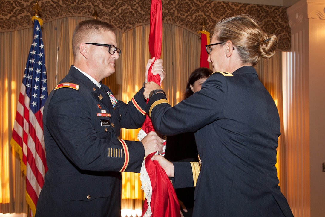 Col. James Handura accepts command of the U.S. Army Corps of Engineers Sacramento District during a July 11, 2019, ceremony at the Masonic Temple in downtown Sacramento, Calif. Brig. Gen. Kim Colloton, South Pacific Division commander, presided over the ceremony where Handura became the district’s 33rd commander in its 90-year history.