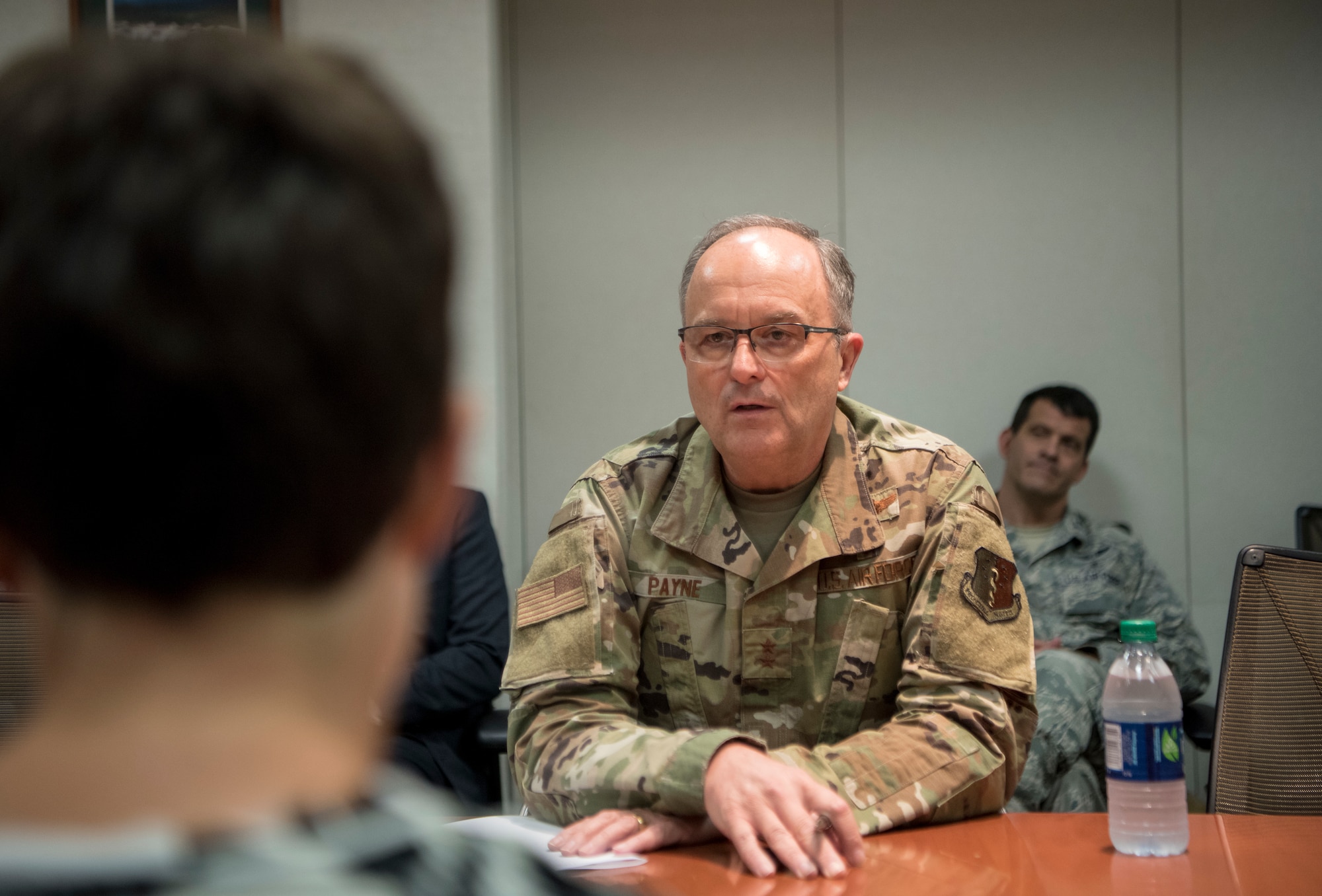 A member of the media, interviews U.S. Air Force Maj. Gen. Lee E. Payne, Defense Health Agency Assistant Director for Combat Support, and Military Health System Electronic Health Record Functional Champion during his visit at Joint Base Elmendorf-Richardson, Alaska, July 9, 2019. Payne discussed upcoming changes to MHS and what that means for patients and providers.