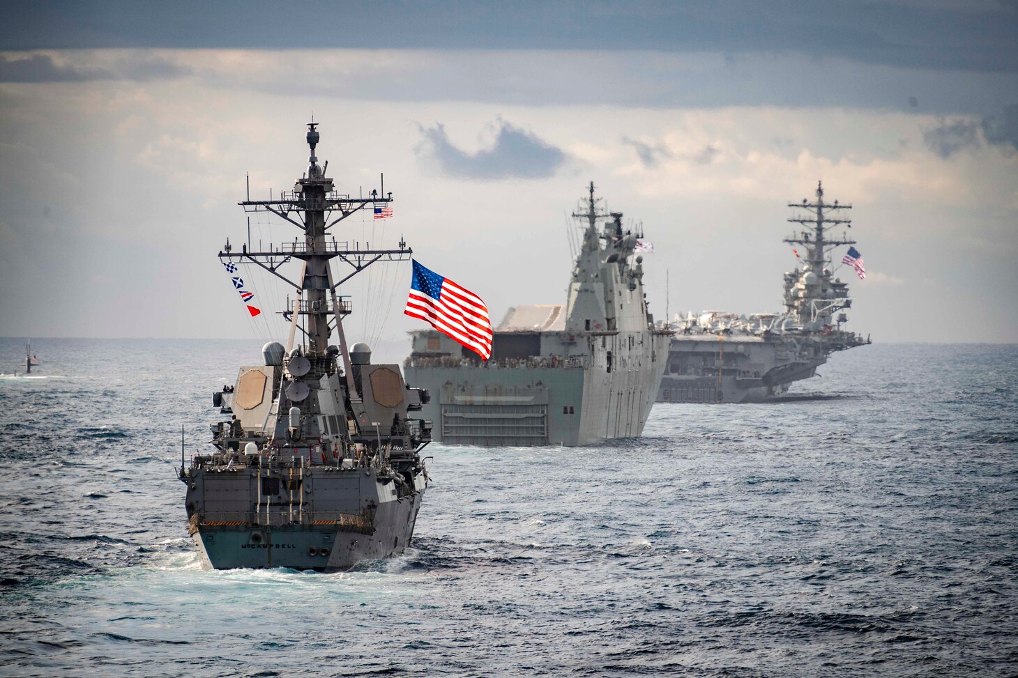 190711-N-WI365-1052 TASMAN SEA (July 11, 2019) – The amphibious dock landing ship USS Ashland (LSD 48) sails in formation behind the Arleigh Burke-class guided-missile destroyer USS McCampbell (DDG 85), center, the Royal Australian Navy Canberra-class landing helicopter dock HMAS Canberra (L02), left, the U.S. Navy Los Angeles-class submarine attack USS Key West (SSN 722), far left, and the U.S. Navy’s Nimitz-class aircraft carrier USS Ronald Reagan (CVN 76), during Talisman Sabre 2019. Ashland, part of the Wasp Amphibious Ready Group, with embarked 31st Marine Expeditionary Unit, is currently participating in Talisman Sabre 2019 off the coast of Northern Australia. A bilateral, biennial event, Talisman Sabre is designed to improve U.S. and Australian combat training, readiness and interoperability through realistic, relevant training necessary to maintain regional security, peace and stability.