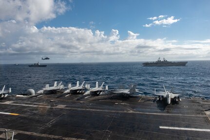 CORAL SEA (July 11, 2019) The Navy’s forward-deployed aircraft carrier USS Ronald Reagan (CVN 76) sails alongside, from right to left, the U.S. Navy’s Amphibious assault ship USS Wasp (LHD 1), USS William P. Lawrence (DDG 110), the Royal Canadian Navy’s HMAS Regina, ¬the Japan Maritime Self-Defense Force’s JS Ise (DDH 182), USCGC Stratton (CGC 752), and USS McCampbell (DDG 85) during Talisman Sabre 2019. Talisman Sabre 2019 illustrates the closeness of the Australian and U.S. alliance and the strength of the military-to-military relationship. This is the eighth iteration of this exercise.