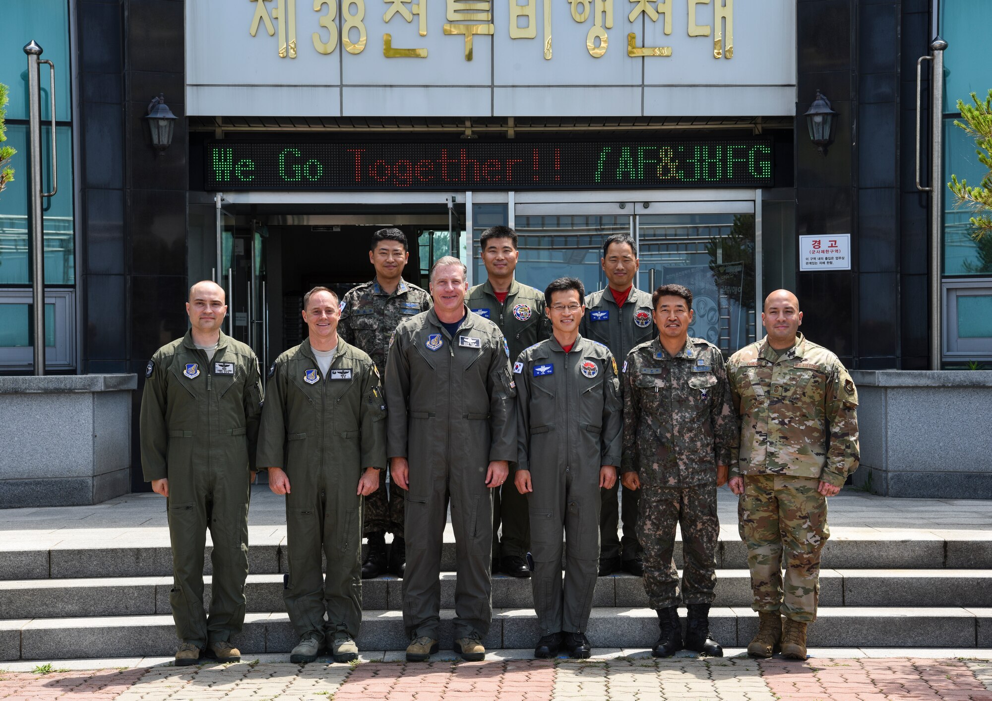 U.S. Air Force Brig. Gen. David Eaglin (third from the left), 7th Air Force vice commander, poses for a photo with 8th Fighter Wing and 38th Fighter Group leadership at Kunsan Air Base, Republic of Korea, July 12, 2019. Eaglin went on an immersion tour at Kunsan, to see first-hand the capabilities the Wolf Pack and Republic of Korea Air Force bring to the table. (U.S. Air Force photo by Staff Sgt. Joshua Edwards)