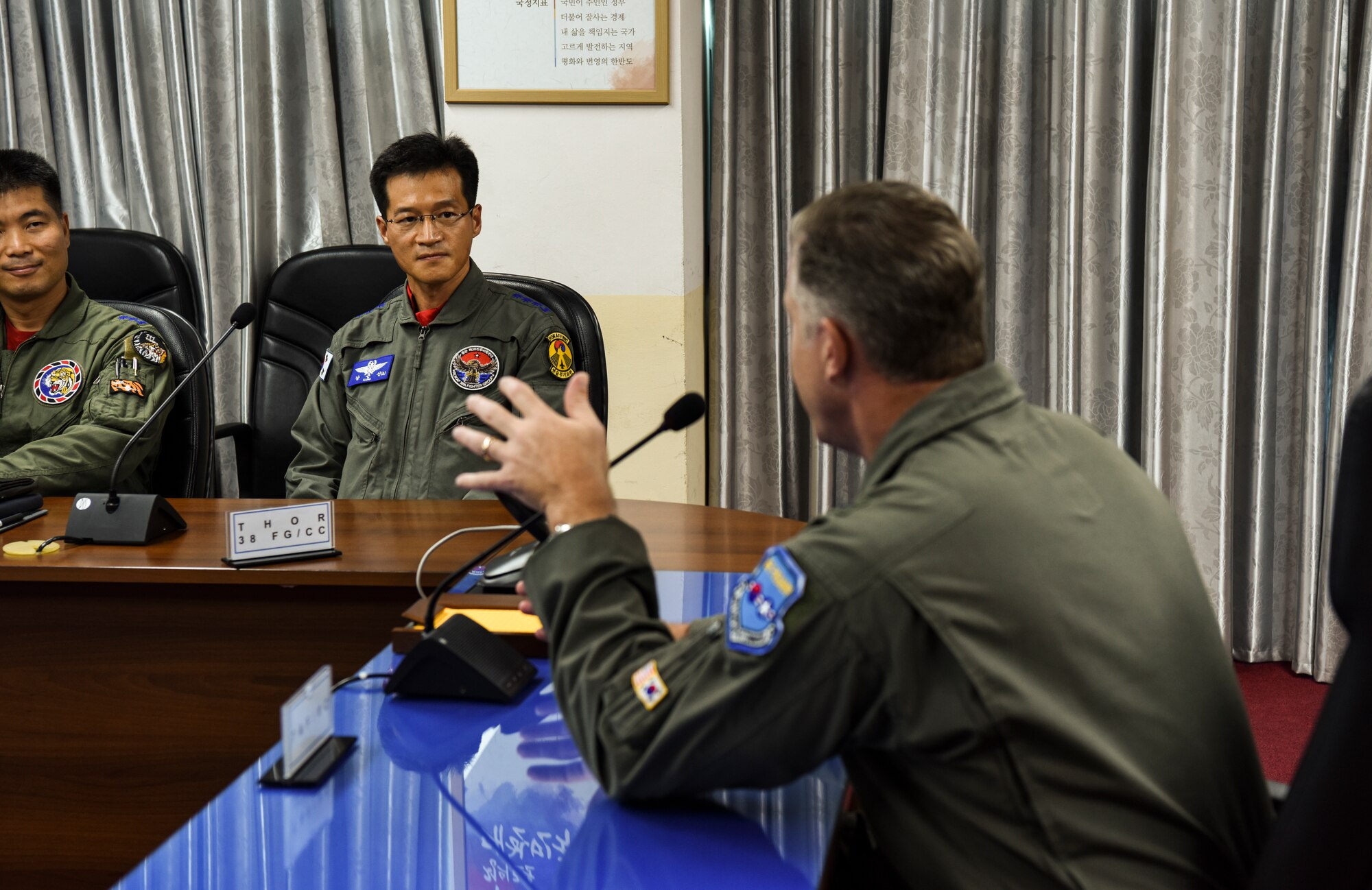 U.S. Air Force Brig. Gen. David Eaglin (right), 7th Air Force vice commander, speaks with Col. Keun-Shin Kang, 38th Fighter Group commander, during an immersion tour at Kunsan Air Base, Republic of Korea, July 12, 2019. Eaglin visited Kunsan and Republic of Korea Air Force’s 38th FG to introduce himself and strengthen the partnership between the U.S. and ROK. (U.S. Air Force photo by Staff Sgt. Joshua Edwards)