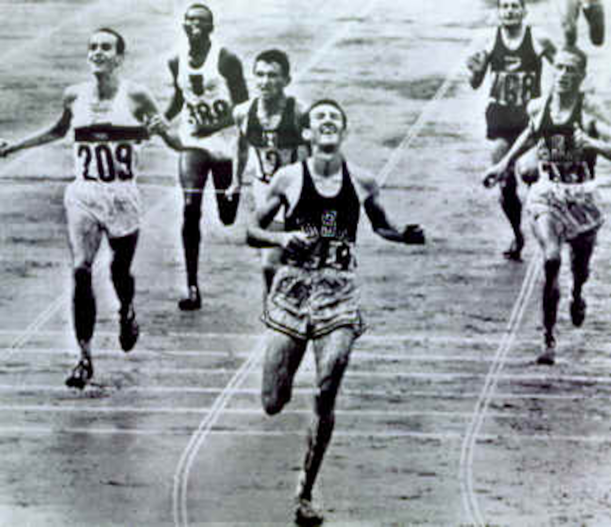 Bob Schul crossing the finish line at the 1964 Olympics in Tokyo, Japan.  Schul is the first and only Team USA runner to win the 5,000 meters at the Olympic games.  Schul is scheduled to be the second guest speaker at the 23rd Air Force Marathon. (Contributed photo)