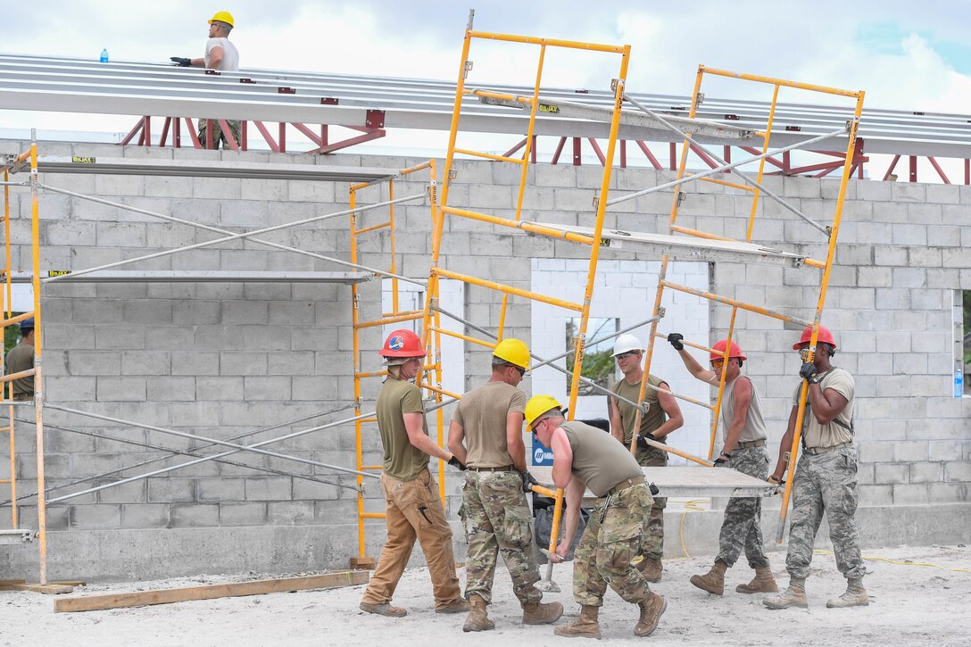 Engineers construct a community center.