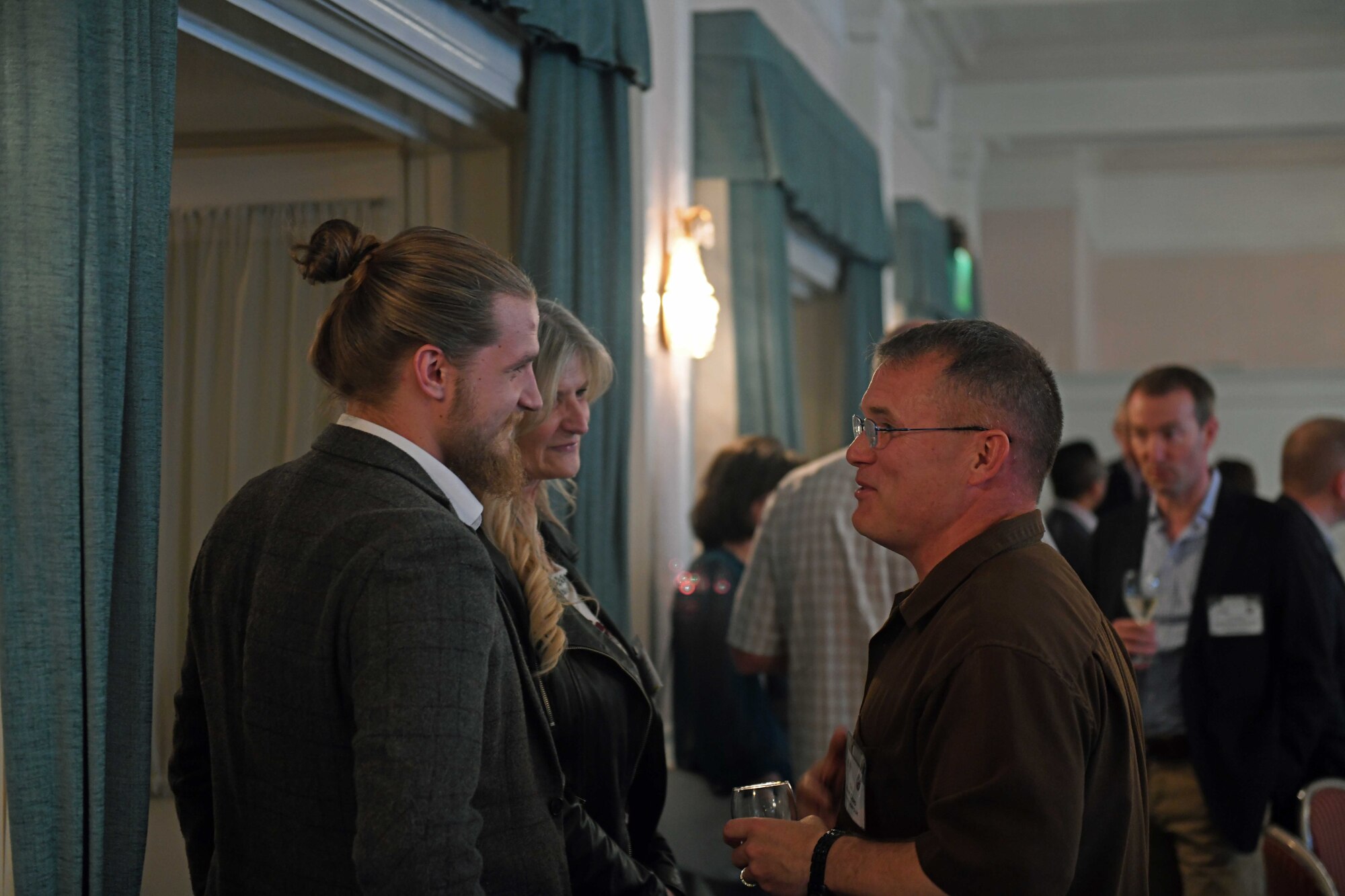 U.S. Air Force Col. Mark Ciero, U.S. Air Forces in Europe-United Kingdom director, talks to civic leaders during the USAFE-UK annual summer reception June 21, 2019, at RAF Mildenhall, England. Events such as the reception take place throughout the year, and allow local military and community leaders to build social bonds, further strengthening the U.S. visiting forces relationship with British neighbors. (U.S. Air Force photo by Senior Airman Luke Milano)