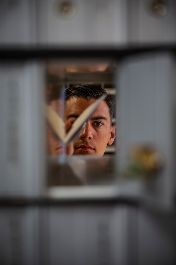 U.S. Marine Sgt. Cameron Rios, a postal clerk with Headquarters and Service Company, Headquarters and Support Battalion, Marine Corps Installations West, Marine Corps Base Camp Pendleton, inserts a letter into a post office box at the Las Pulgas Postal Office at MCB Camp Pendleton, California, June 28, 2019. Rios joined the Marine Corps in 2011 as a postal clerk and currently serves as the Las Pulgas postal office noncomissioned officer-in-charge. He is also a Marine Corps Martial Arts Instructor-Trainer. (U.S. Marine Corps Photo by Cpl. Dylan Chagnon)
