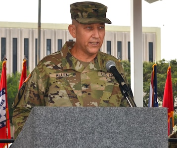 Col. Daniel Allen gives his first remarks as commander of the 470th Military Intelligence Brigade during the brigade’s change of command ceremony at the MacArthur Parade Field at Joint Base San Antonio-Fort Sam Houston July 9.