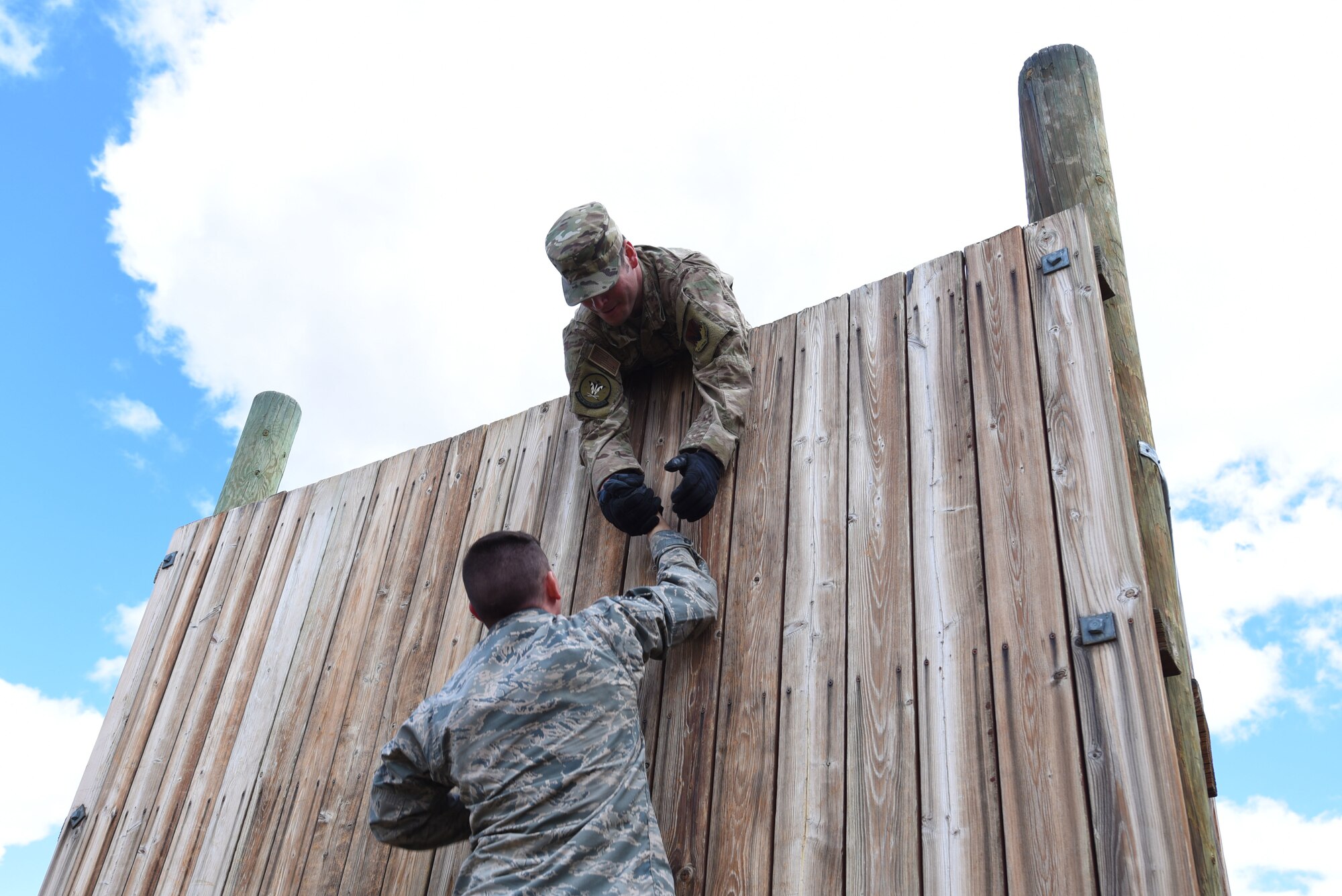 scaling a wall