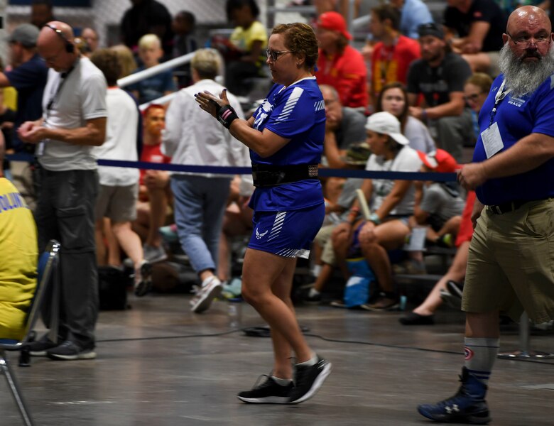 Tech. Sgt. (Ret.) Melissa Nueva prepares to bench press during a powerlifting competition, June 24, 2019, in Tampa, Florida.