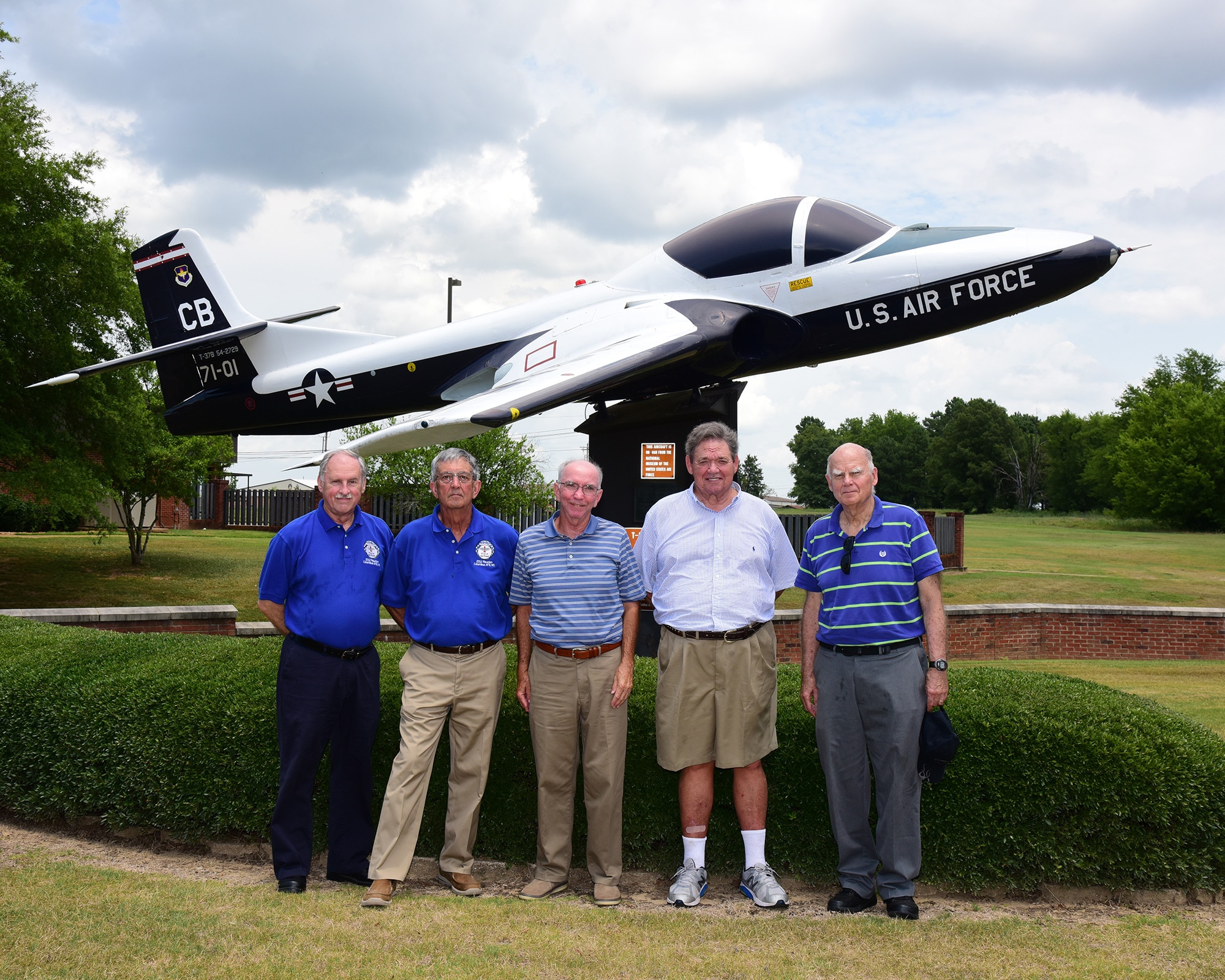 Five members from Undergraduate Pilot Training class 71-01, nicknamed “First of the Finest,” stand in front of a T-37 Tweet, July 3, 2019, on Columbus Air Force Base, Miss. (U.S. Air Force photo by Sharon Ybbara)