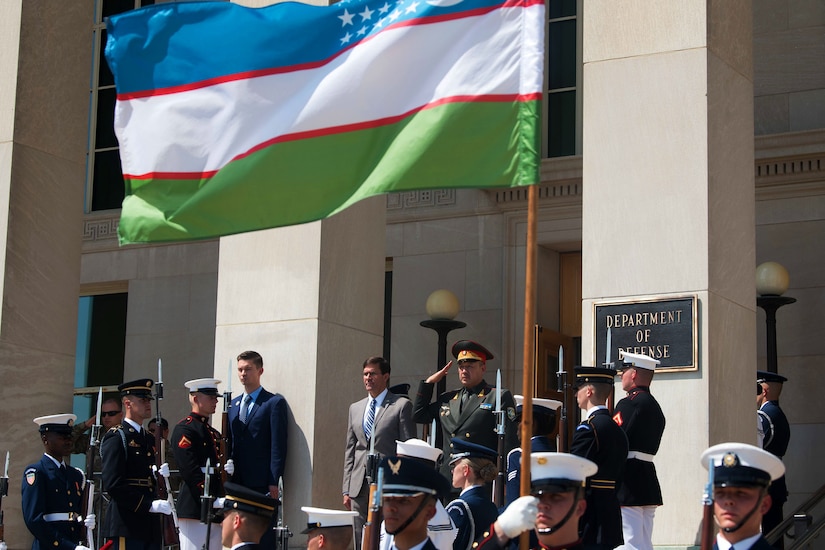 Acting Defense Secretary Dr. Mark T. Esper stands at the top of Pentagon steps with Uzbekistan Defense Minister Bakhodir Kurbanov.