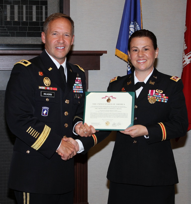 Maj. Gen. Jeffrey L. Milhorn, commander of the North Atlantic Division, presented LTC Kristen Dahle with a Meritorious Service Medal prior to a Change of Command ceremony. Dahle served as Commander of the USACE Philadelphia District from 2017-2019.